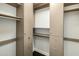 Walk-in closet with built-in shelves and drawers at 15215 N Kierland Blvd # 632, Scottsdale, AZ 85254