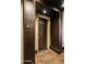 Building entryway with modern tile floor and door at 15215 N Kierland Blvd # 632, Scottsdale, AZ 85254