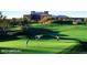 Scenic golf course with putting green and resort in background at 15215 N Kierland Blvd # 632, Scottsdale, AZ 85254