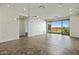 Modern living room with tiled floors and sliding doors to balcony at 15215 N Kierland Blvd # 632, Scottsdale, AZ 85254