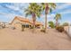 Backyard view, showcasing desert landscaping and a home at 15225 W Via Manana Dr, Sun City West, AZ 85375