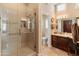 Spa-like bathroom with a large shower and double sinks at 15225 W Via Manana Dr, Sun City West, AZ 85375