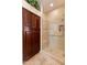 Bathroom boasts a large walk-in shower, built-in storage, and updated fixtures at 15225 W Via Manana Dr, Sun City West, AZ 85375