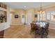 Bright dining room with a wooden table and hutch, perfect for Gathering meals at 15225 W Via Manana Dr, Sun City West, AZ 85375