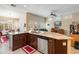 Large kitchen island with granite countertops at 15225 W Via Manana Dr, Sun City West, AZ 85375