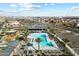 Aerial view of community pool, playground, and clubhouse at 16780 W Cameron Dr, Surprise, AZ 85388