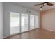 Living room with sliding glass doors leading to patio at 17251 N Del Webb Blvd, Sun City, AZ 85373