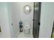 Clean and modern bathroom with a toilet and stylish mirror at 18145 W Rancho Dr, Litchfield Park, AZ 85340