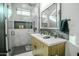 Elegant bathroom with a frameless glass shower and modern vanity at 18145 W Rancho Dr, Litchfield Park, AZ 85340