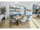 Bright dining area with wood table and modern chairs at 18145 W Rancho Dr, Litchfield Park, AZ 85340