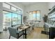 Elegant dining area with sliding doors to backyard pool at 18145 W Rancho Dr, Litchfield Park, AZ 85340