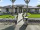 Stunning modern home with stone accents and lush landscaping at 18145 W Rancho Dr, Litchfield Park, AZ 85340