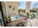 Clean hot tub on patio with basketball hoop nearby at 18145 W Rancho Dr, Litchfield Park, AZ 85340