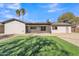 Newly renovated home with a grassy backyard at 1819 W Evans Dr, Phoenix, AZ 85023