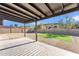 Covered patio overlooking a grassy backyard at 1819 W Evans Dr, Phoenix, AZ 85023