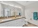 Modern bathroom with double vanity and updated fixtures at 1819 W Evans Dr, Phoenix, AZ 85023