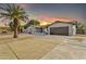 Single story home with 2 car garage and landscaped yard at 1819 W Evans Dr, Phoenix, AZ 85023