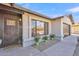 Front view of house with landscaping and walkway to entryway at 1819 W Evans Dr, Phoenix, AZ 85023