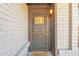 Front door entry with security door and welcome mat at 1819 W Evans Dr, Phoenix, AZ 85023