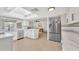 Bright kitchen, featuring stainless steel appliances and white cabinets at 1819 W Evans Dr, Phoenix, AZ 85023