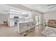 Modern kitchen featuring white cabinets and a breakfast bar at 1819 W Evans Dr, Phoenix, AZ 85023