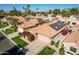 Single-story home with solar panels and beautiful landscaping at 19111 N 94Th Ave, Peoria, AZ 85382