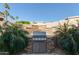 Built-in outdoor grill with stonework and landscaping at 19111 N 94Th Ave, Peoria, AZ 85382