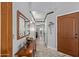 Bright entryway with wood floors and a wooden console table at 19111 N 94Th Ave, Peoria, AZ 85382