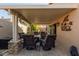 Outdoor patio with seating area and fire pit at 19111 N 94Th Ave, Peoria, AZ 85382