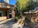 Small backyard with gravel and a partially visible fence at 20391 E Via Del Oro Dr, Queen Creek, AZ 85142