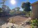 Large backyard with gravel and a small paved area at 20391 E Via Del Oro Dr, Queen Creek, AZ 85142