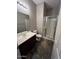 Clean bathroom, features a shower, toilet and vanity at 20391 E Via Del Oro Dr, Queen Creek, AZ 85142