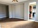 Open living room with views to kitchen area at 20391 E Via Del Oro Dr, Queen Creek, AZ 85142