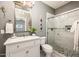 Modern bathroom with white vanity and a walk-in shower at 22012 N Arrellaga Dr, Sun City West, AZ 85375