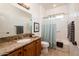 Clean bathroom with granite countertop and light blue accents at 22012 N Arrellaga Dr, Sun City West, AZ 85375