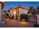 Inviting casita with seating area, and well-manicured landscaping at 22012 N Arrellaga Dr, Sun City West, AZ 85375