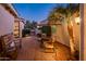 Peaceful courtyard with seating area and lush greenery at 22012 N Arrellaga Dr, Sun City West, AZ 85375