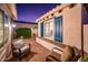 Serene courtyard with seating area and brick pavers at 22012 N Arrellaga Dr, Sun City West, AZ 85375