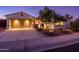 Beautiful home with a two-car garage and well-manicured landscaping at 22012 N Arrellaga Dr, Sun City West, AZ 85375