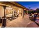 Extended patio with comfortable seating and a view of the pool and backyard at 22012 N Arrellaga Dr, Sun City West, AZ 85375