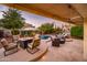 Enjoy evenings by the fire pit on this spacious patio at 22012 N Arrellaga Dr, Sun City West, AZ 85375