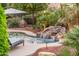 Inviting pool with waterfall feature at 22012 N Arrellaga Dr, Sun City West, AZ 85375