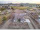 Aerial view of a new construction craftsman style home in a rural setting at 22859 W Euclid Ave, Buckeye, AZ 85326