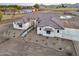 Aerial view of a new construction craftsman style home with tile roof at 22859 W Euclid Ave, Buckeye, AZ 85326