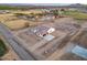 Aerial view of a craftsman style home with tile roof and landscaping at 22859 W Euclid Ave, Buckeye, AZ 85326