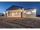 Covered patio in the backyard with view of kitchen at 22859 W Euclid Ave, Buckeye, AZ 85326