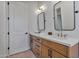 Elegant bathroom, featuring a double vanity and updated fixtures at 22859 W Euclid Ave, Buckeye, AZ 85326