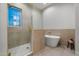 Spa-like bathroom with a freestanding tub and a glass shower at 22859 W Euclid Ave, Buckeye, AZ 85326