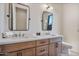 Shared bathroom with double vanity, and updated fixtures at 22859 W Euclid Ave, Buckeye, AZ 85326