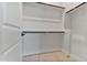 Walk-in closet featuring double rods and shelving at 22859 W Euclid Ave, Buckeye, AZ 85326